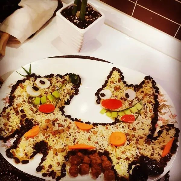 تزیین عدس پلو طرح گربه سگ